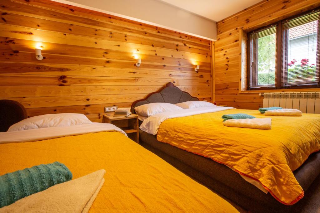 Postel nebo postele na pokoji v ubytování Apartments Tango