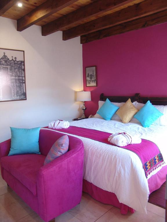 Postel nebo postele na pokoji v ubytování Casa del Tio Hotel Boutique