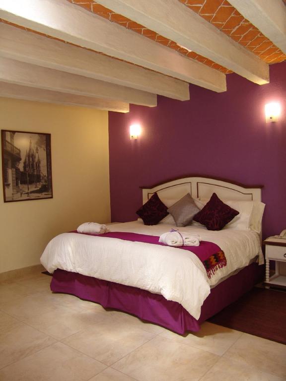 Postel nebo postele na pokoji v ubytování Casa del Tio Hotel Boutique