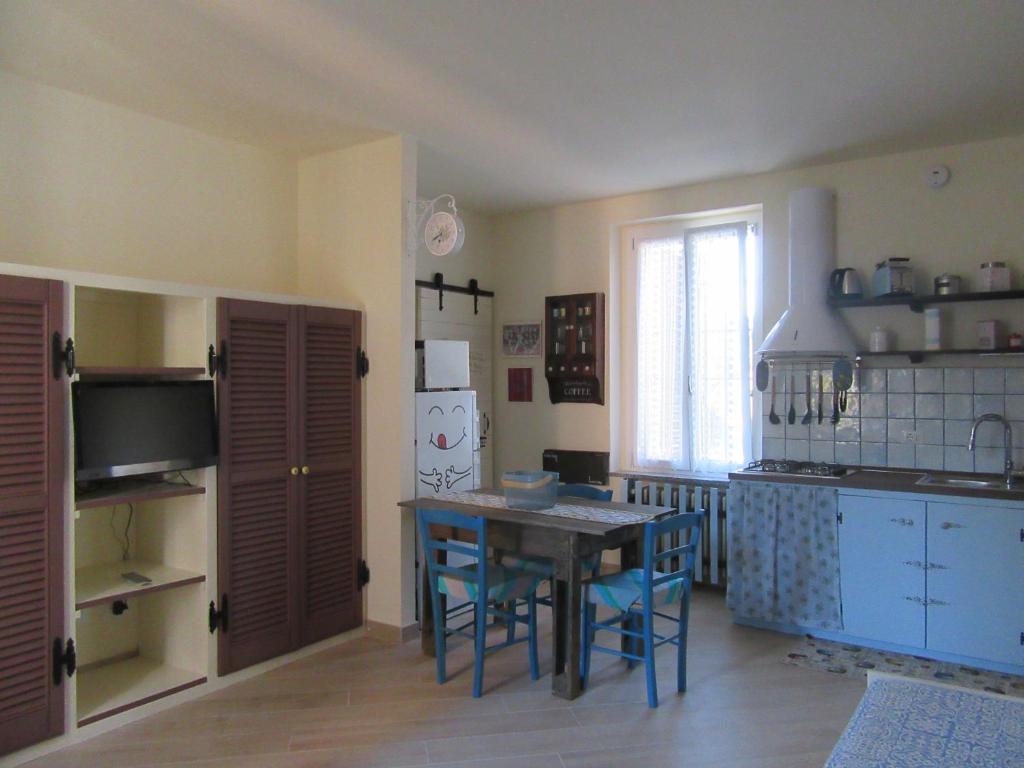 Kuchyň nebo kuchyňský kout v ubytování Un letto nel cortile