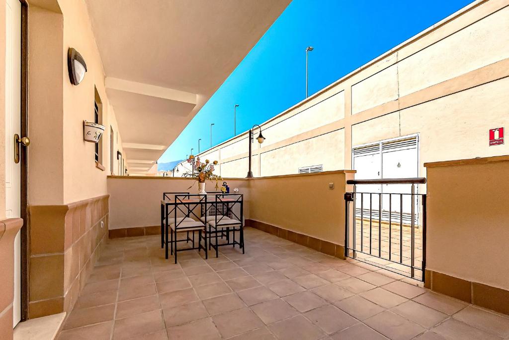 A balcony or terrace at Garden View La Arena