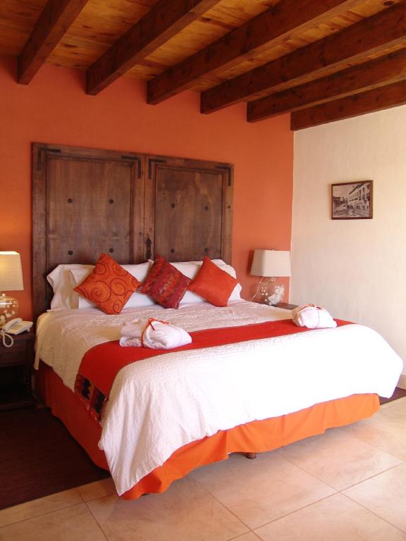 Postel nebo postele na pokoji v ubytování Casa del Tio Hotel Boutique