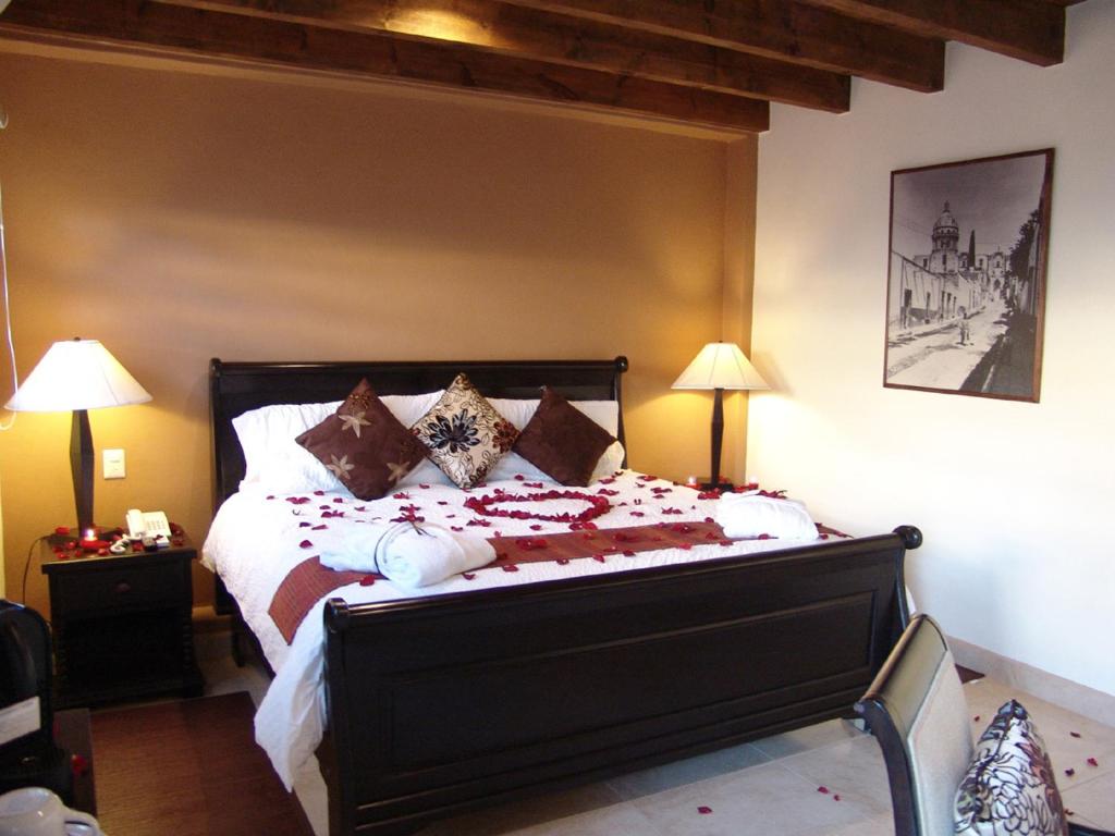 Postel nebo postele na pokoji v ubytování Casa del Tio Hotel Boutique