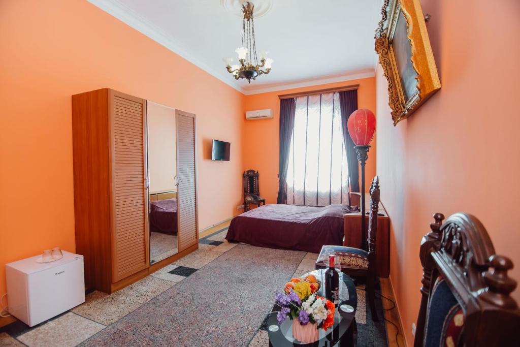Postel nebo postele na pokoji v ubytování Hotel Queen-Batumi