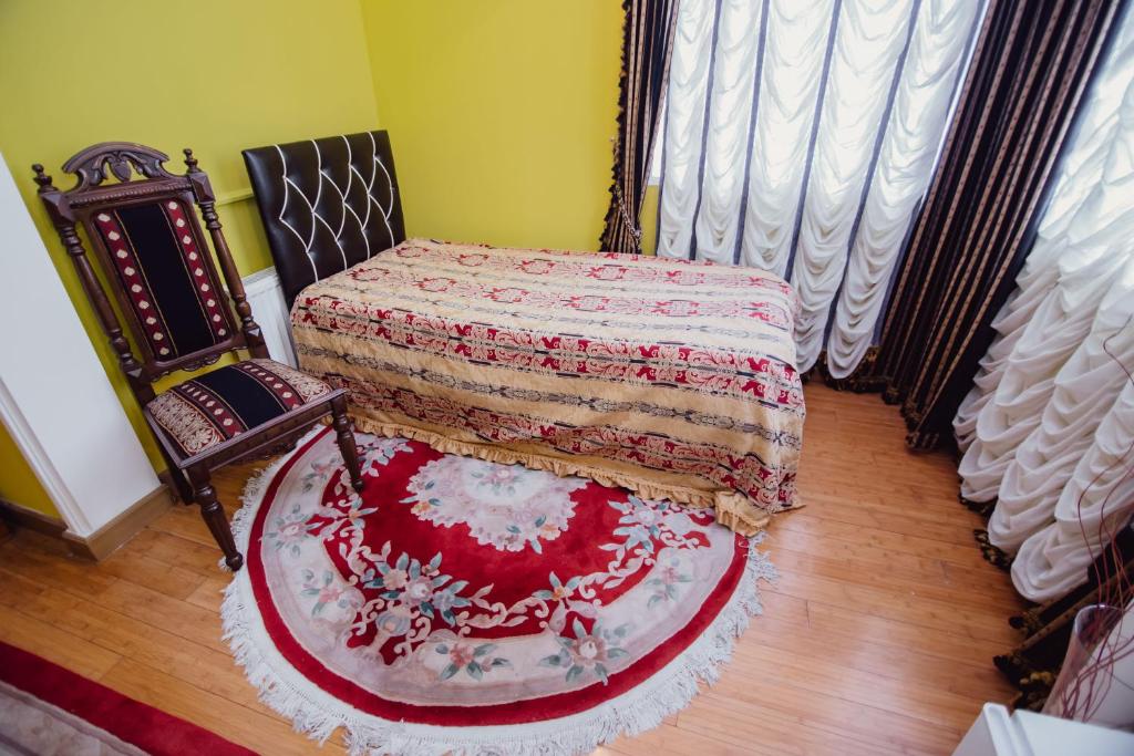 Postel nebo postele na pokoji v ubytování Hotel Queen-Batumi