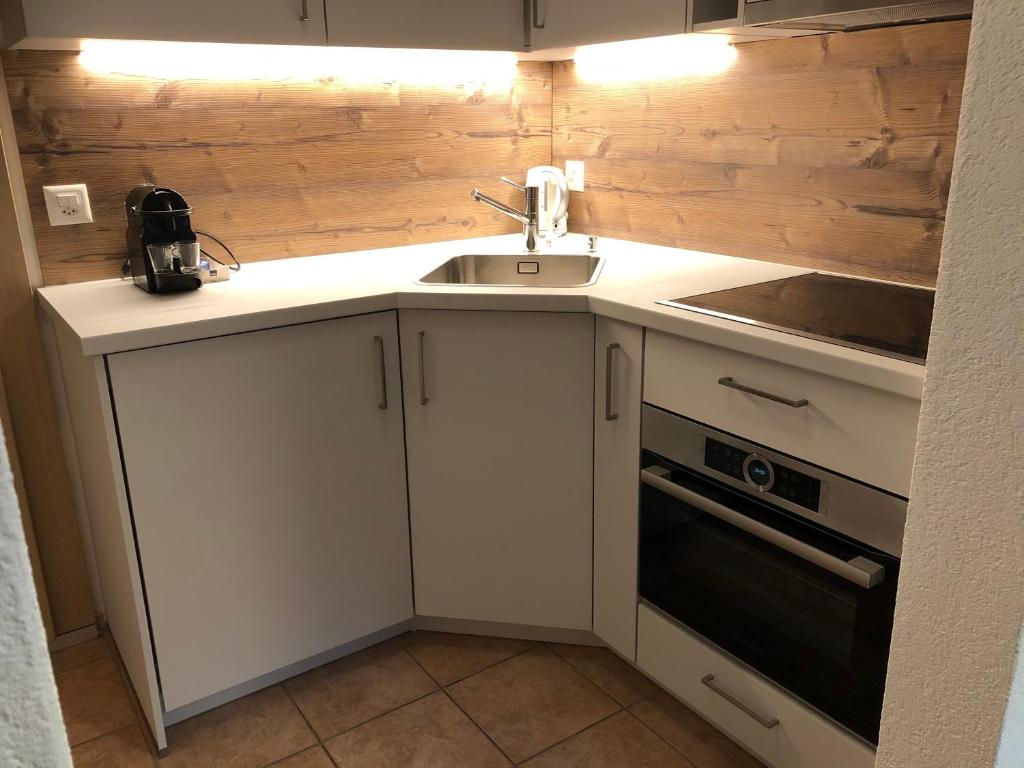 Kuchyň nebo kuchyňský kout v ubytování Haus Galileo