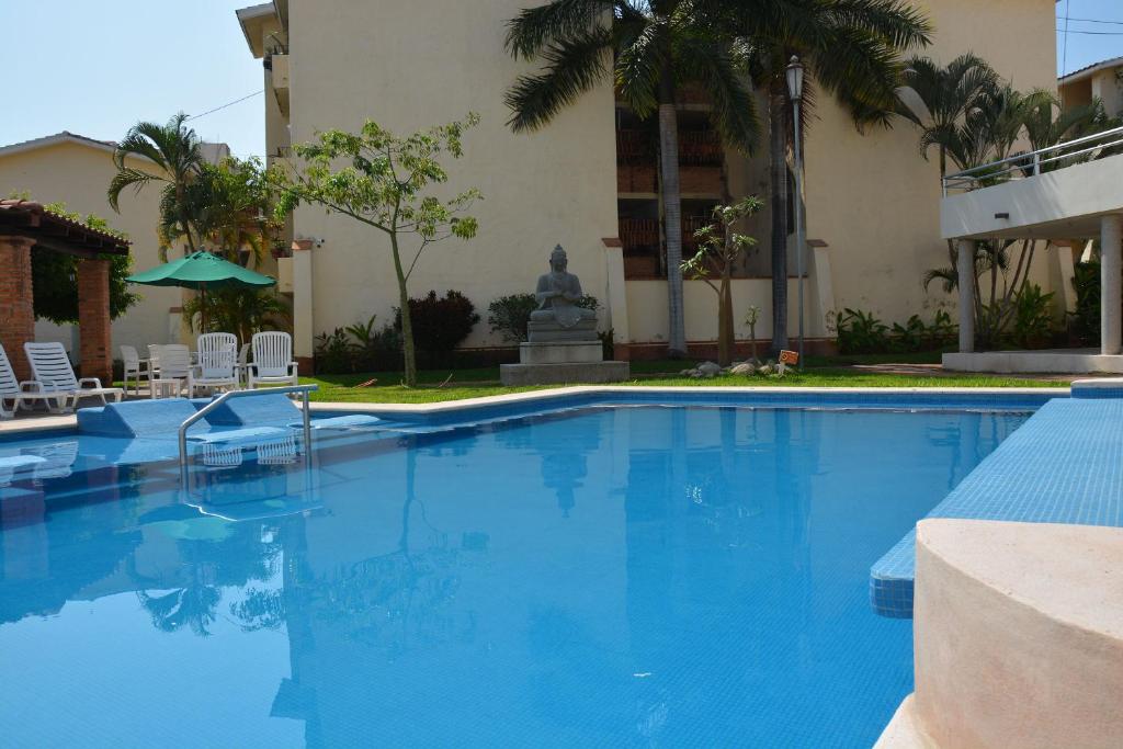 Bazén v ubytování Zenharmony Suites nebo v jeho okolí