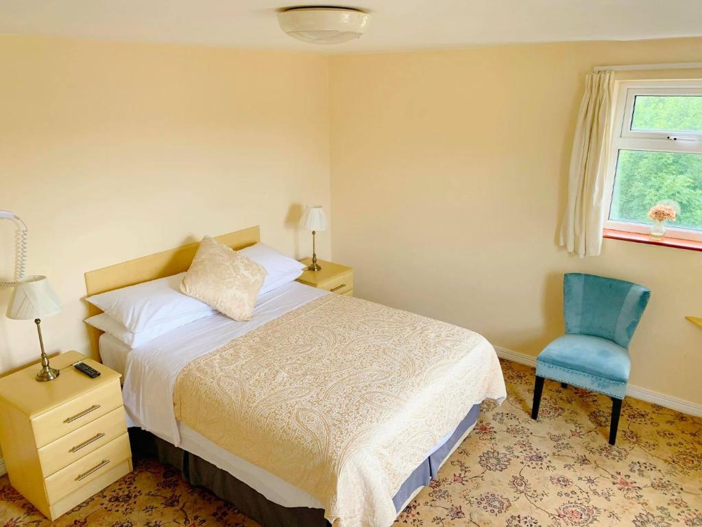 Postel nebo postele na pokoji v ubytování Redclyffe Guesthouse