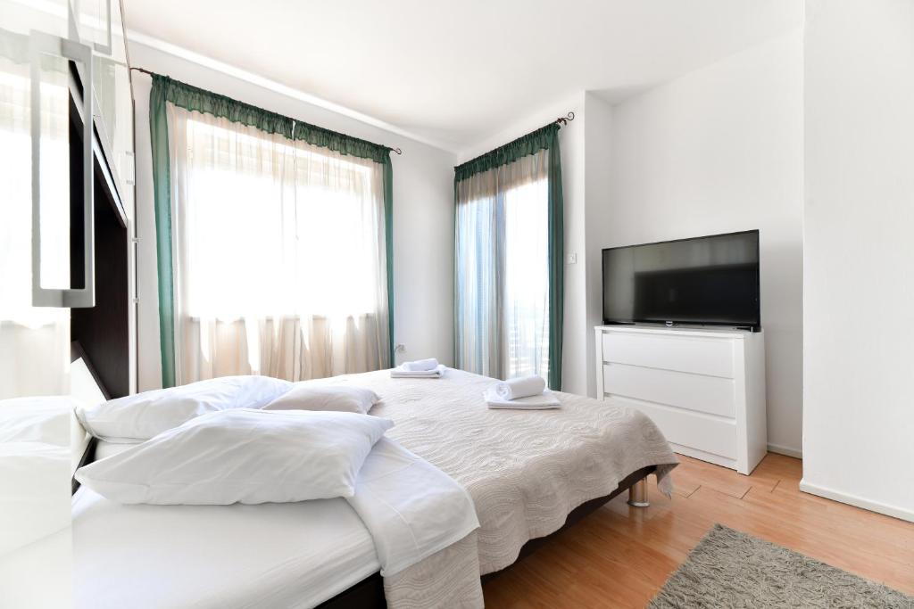 Postel nebo postele na pokoji v ubytování Levant Residence