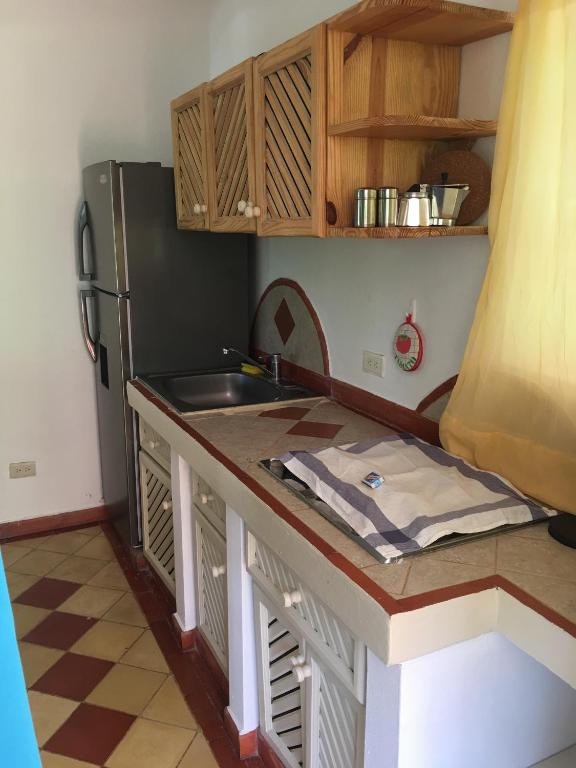 Una cocina o cocineta en Hotel - Residencial Madrugada