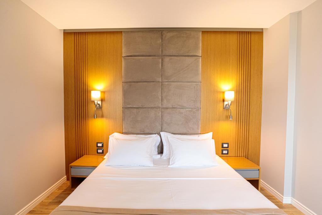 Postel nebo postele na pokoji v ubytování Sea View Hotel