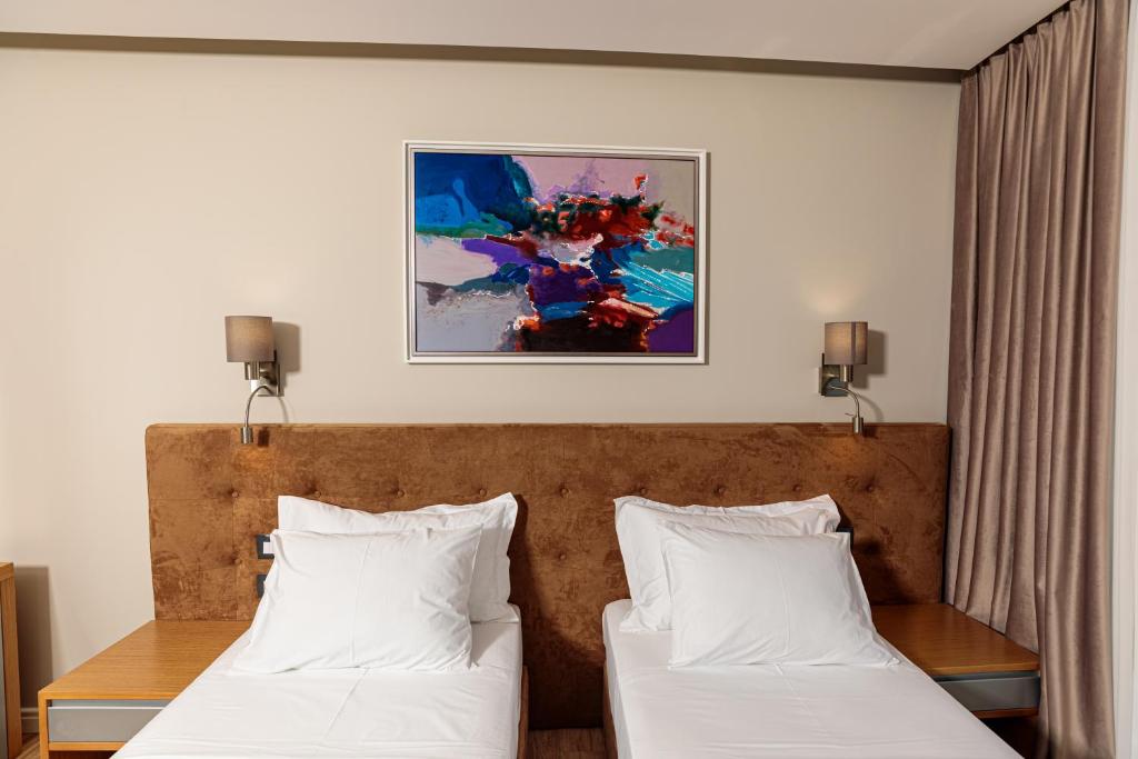 Postel nebo postele na pokoji v ubytování Sea View Hotel