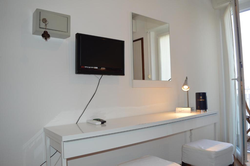 Telewizja i/lub zestaw kina domowego w obiekcie Hotel Merano