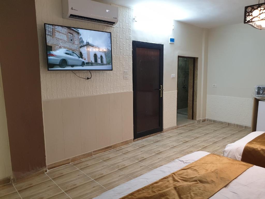 TV a/nebo společenská místnost v ubytování atoom studio