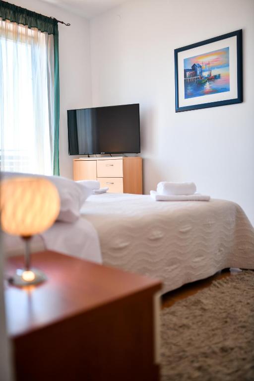 TV a/nebo společenská místnost v ubytování Levant Residence