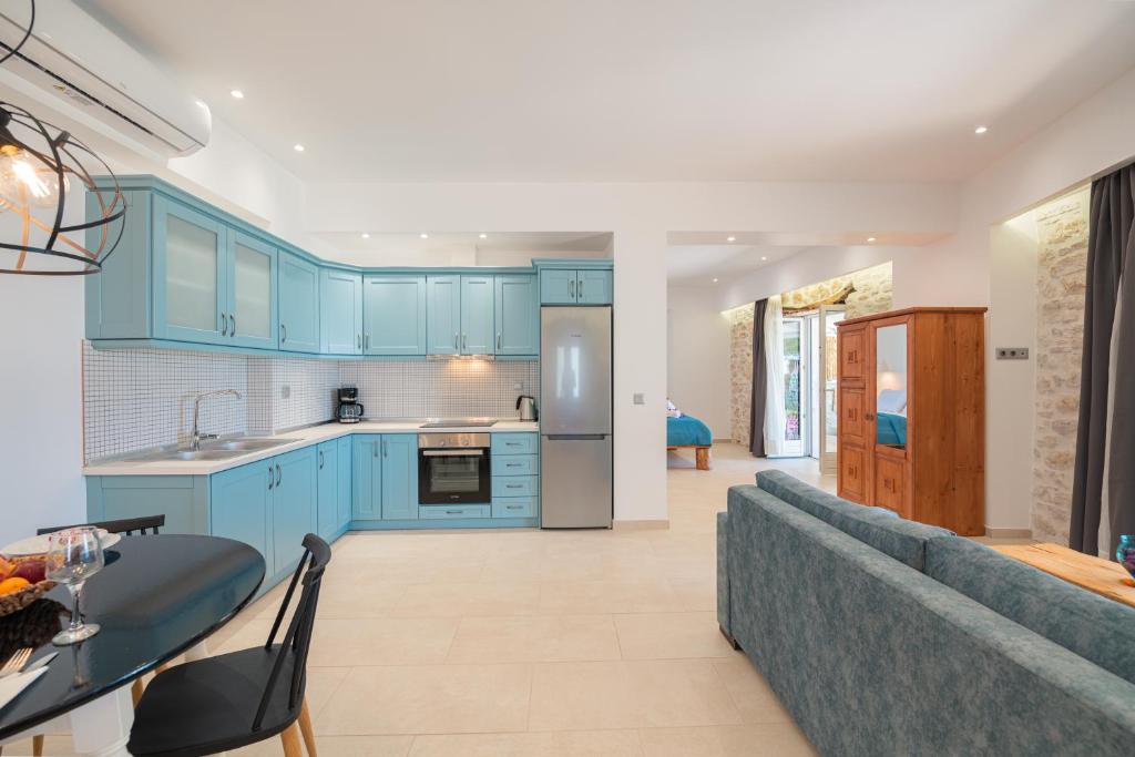 A kitchen or kitchenette at The Beach House Kaminaki