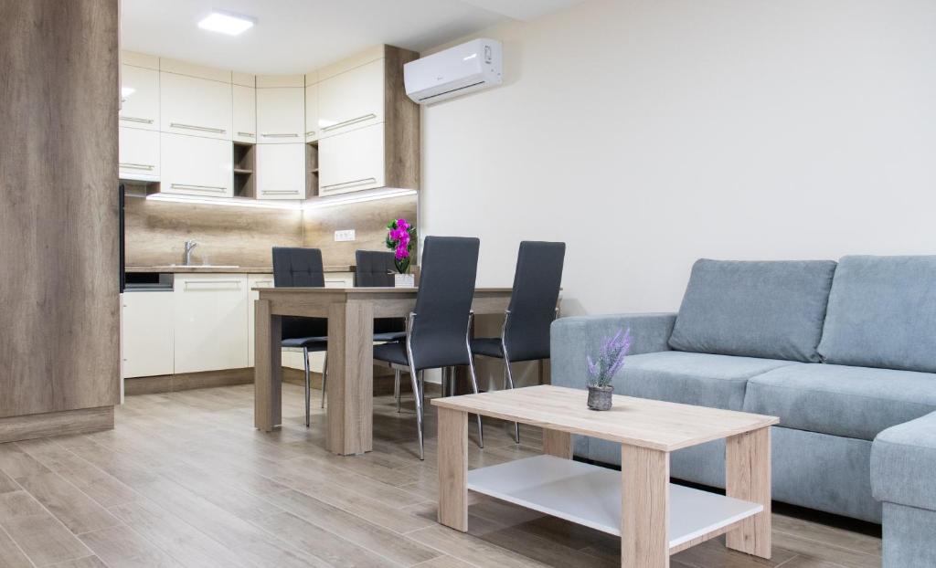 Posedenie v ubytovaní Trika Apartman