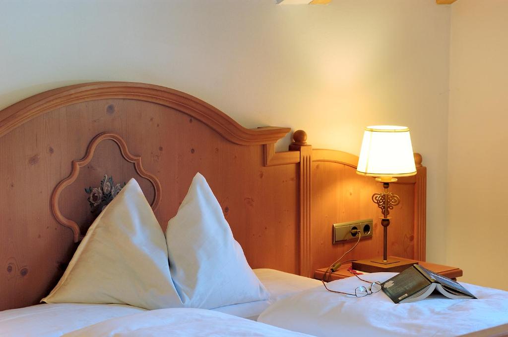 Postel nebo postele na pokoji v ubytování Apartments Hubertushof