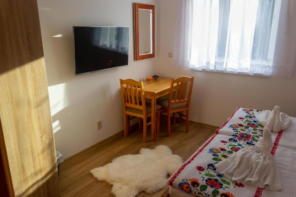 Postel nebo postele na pokoji v ubytování Chalupa Anna