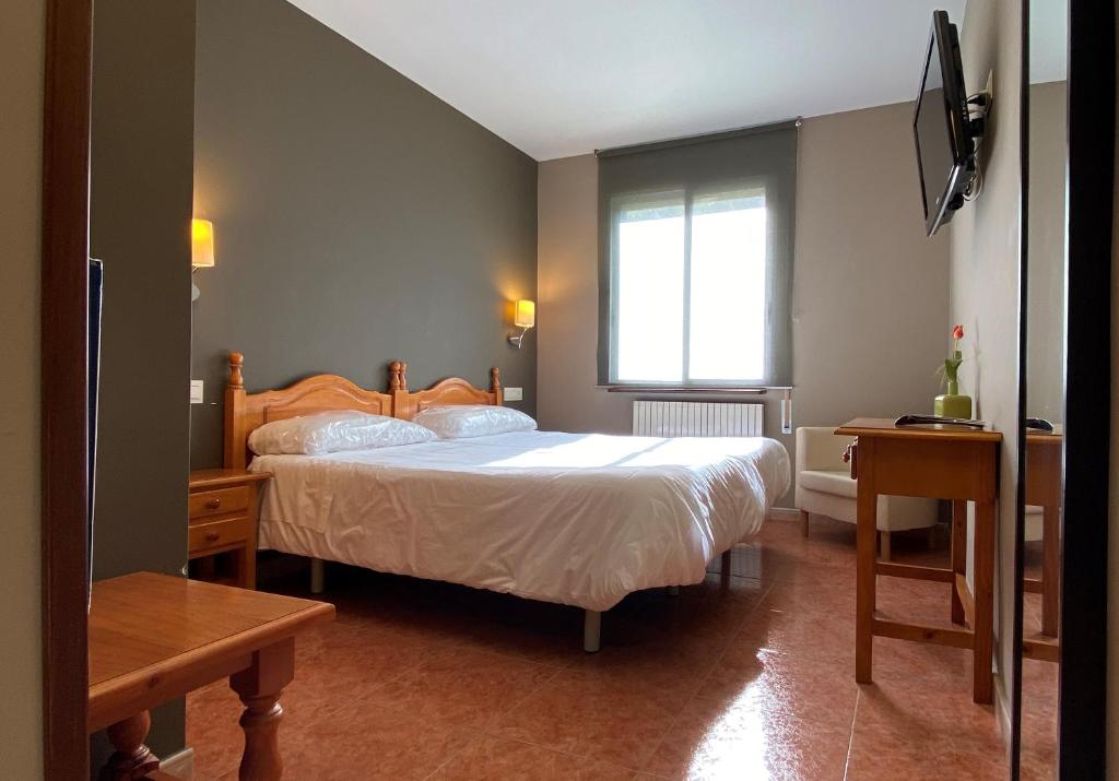 Cama o camas de una habitación en Hotel Casa Custodio
