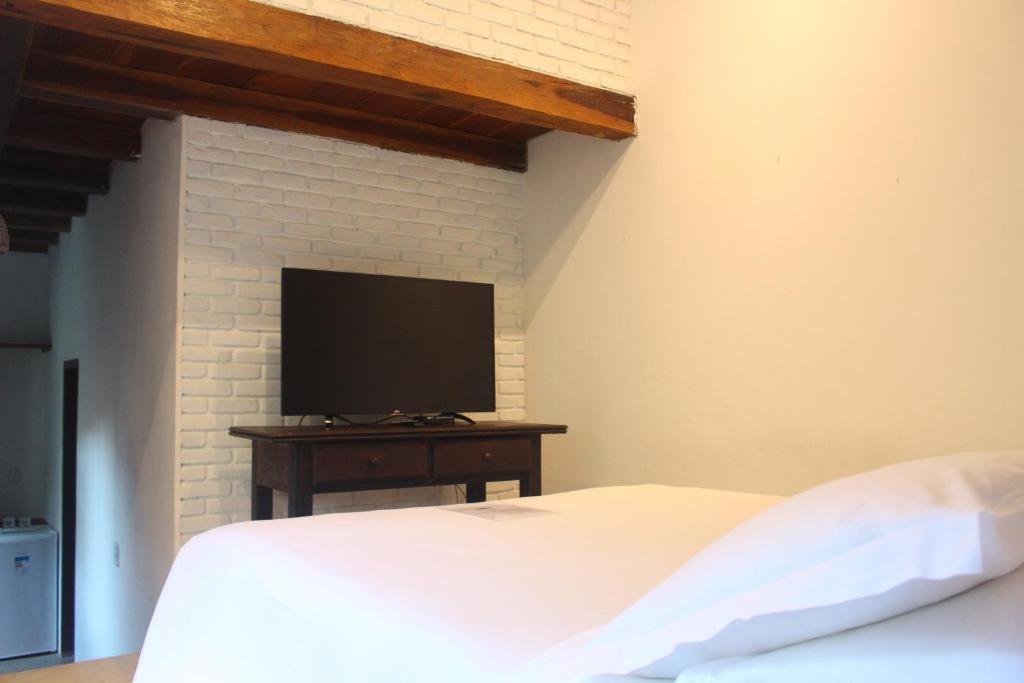 TV a/nebo společenská místnost v ubytování Calypso INN