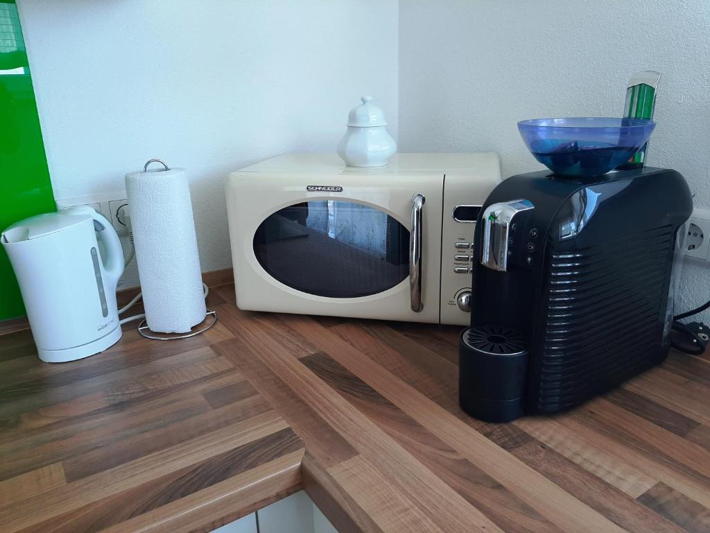 Kuchyň nebo kuchyňský kout v ubytování Jollen Apartments