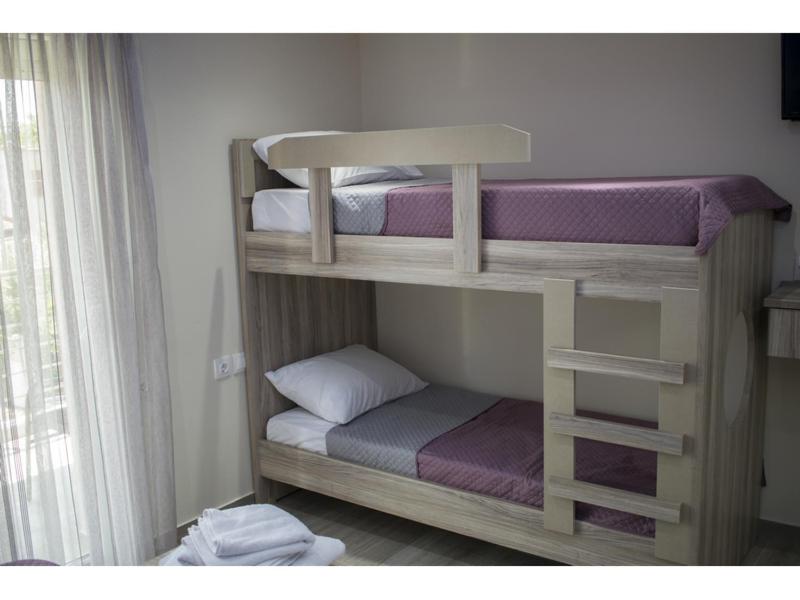 Postel nebo postele na pokoji v ubytování House Diakos Toroni