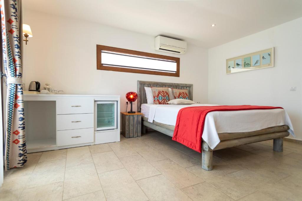 Kuchyň nebo kuchyňský kout v ubytování Mosso Boutique Hotel