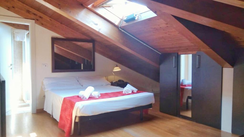 Posteľ alebo postele v izbe v ubytovaní Hotel Alibi