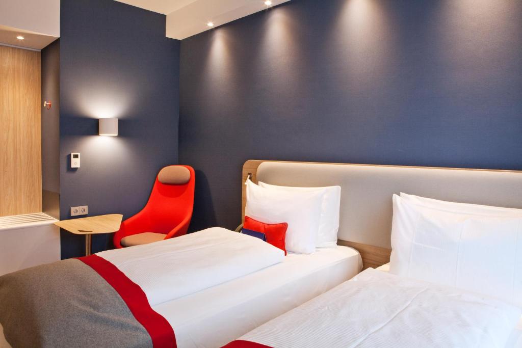 Postel nebo postele na pokoji v ubytování Holiday Inn Express - Saarbrücken by IHG