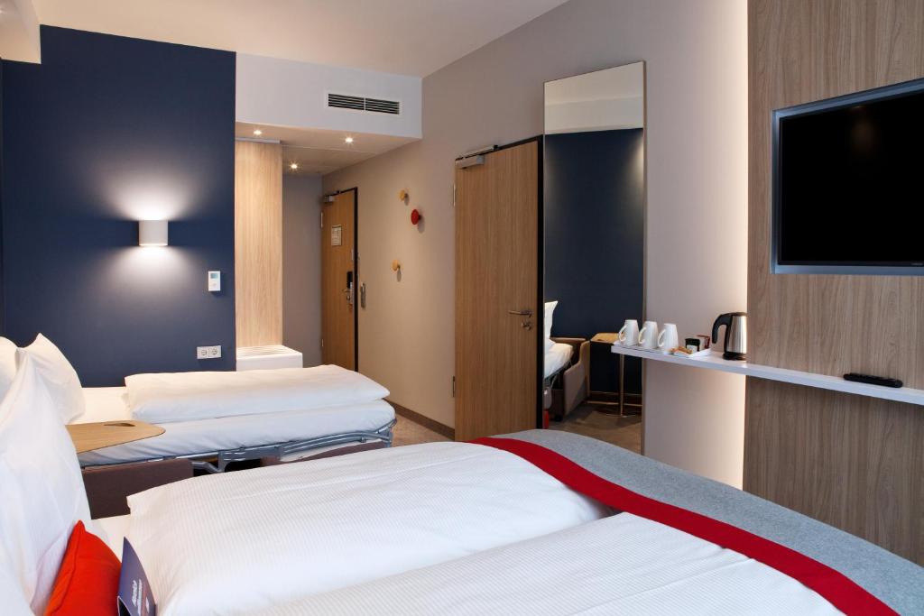 Postel nebo postele na pokoji v ubytování Holiday Inn Express - Saarbrücken by IHG