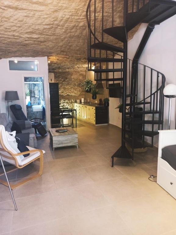 Posezení v ubytování Casa Cueva Un Rincón en la Roca