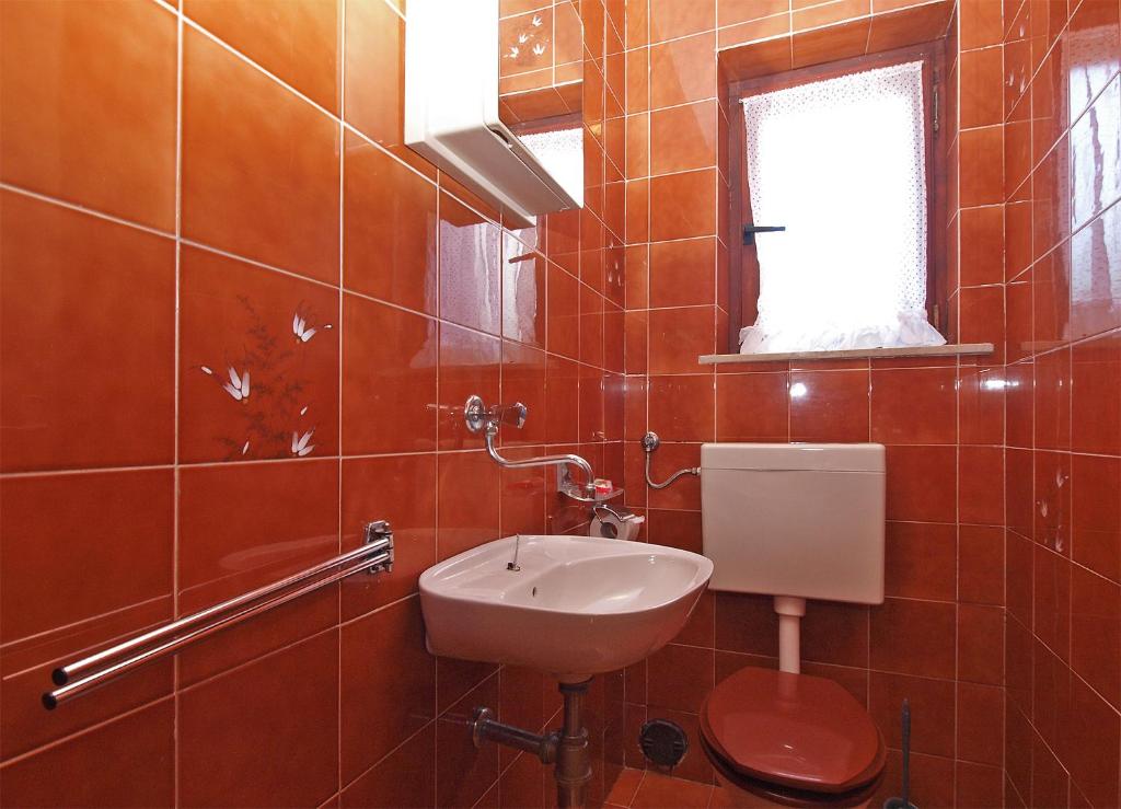 Kúpeľňa v ubytovaní Apartments Evelina 1057