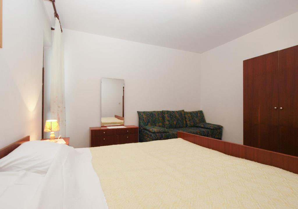 Posteľ alebo postele v izbe v ubytovaní Apartments Evelina 1057