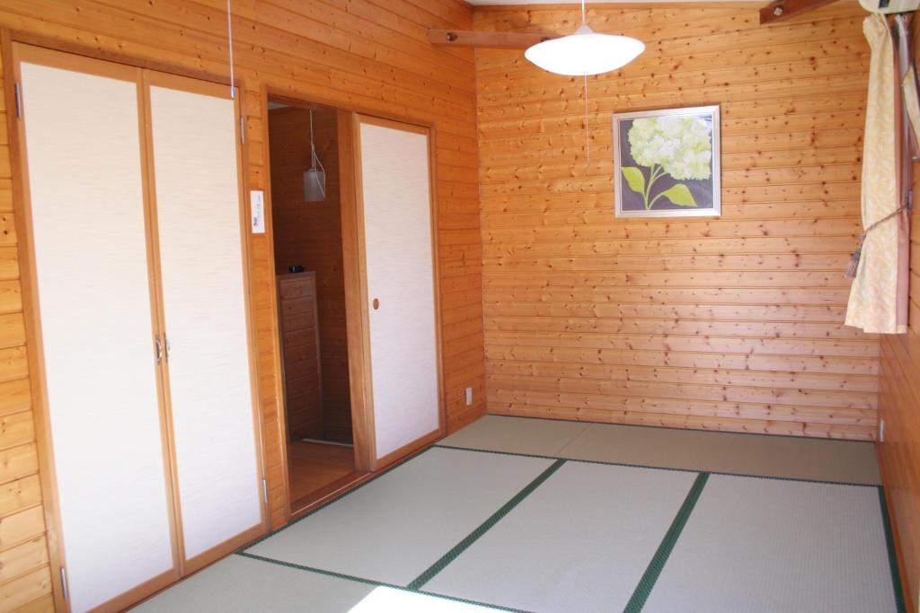 Postel nebo postele na pokoji v ubytování Ururun Kawaguchiko
