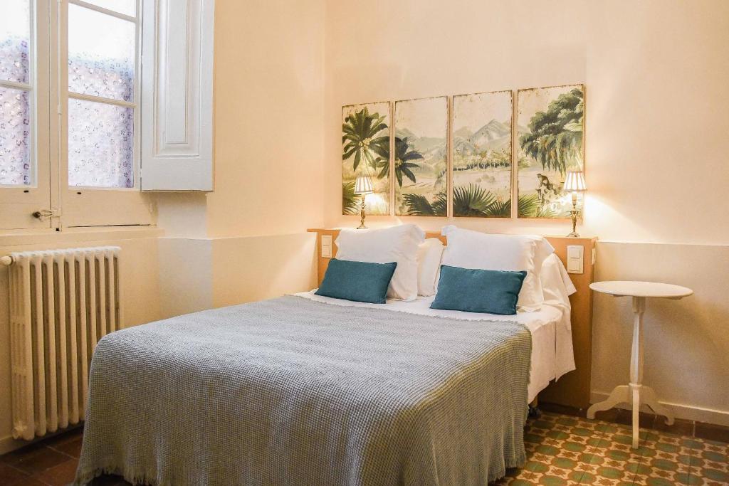 Postel nebo postele na pokoji v ubytování Hotel Aiguaclara