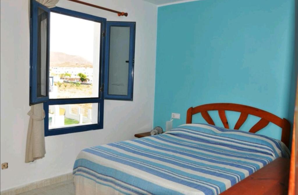 Postel nebo postele na pokoji v ubytování Casa el mar
