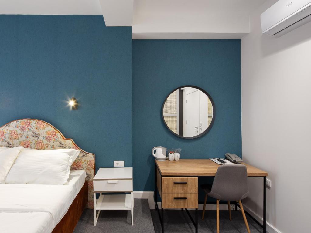 Krevet ili kreveti u jedinici u okviru objekta Hotel Bohemian Garni - Skadarlija