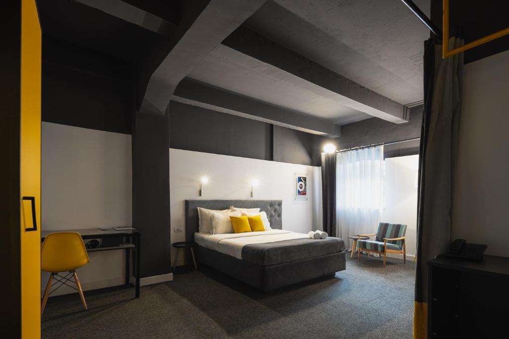 Postel nebo postele na pokoji v ubytování Hotel Bohemian Garni - Skadarlija