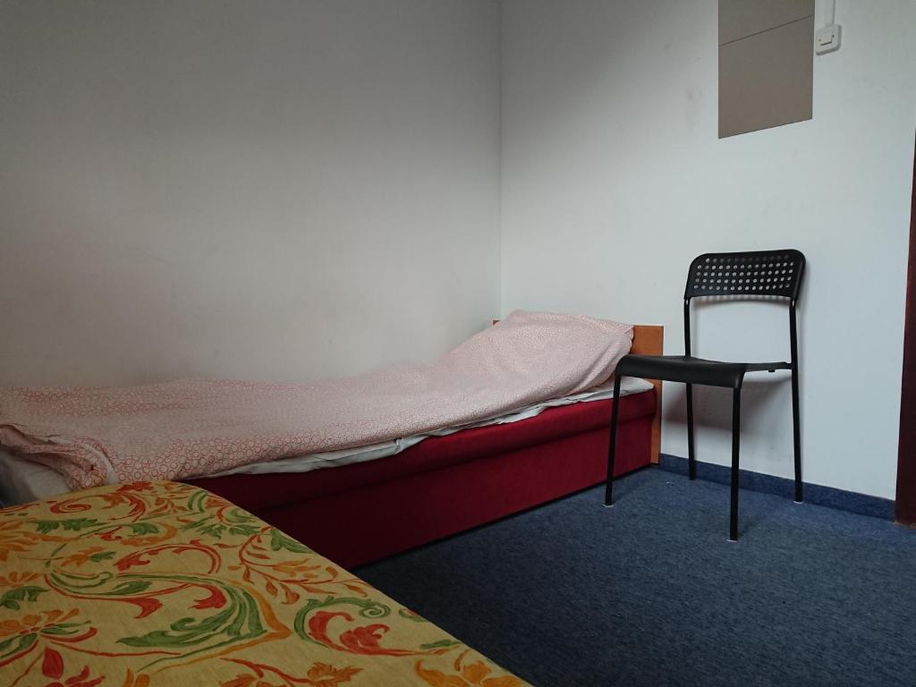 Postel nebo postele na pokoji v ubytování MHostel