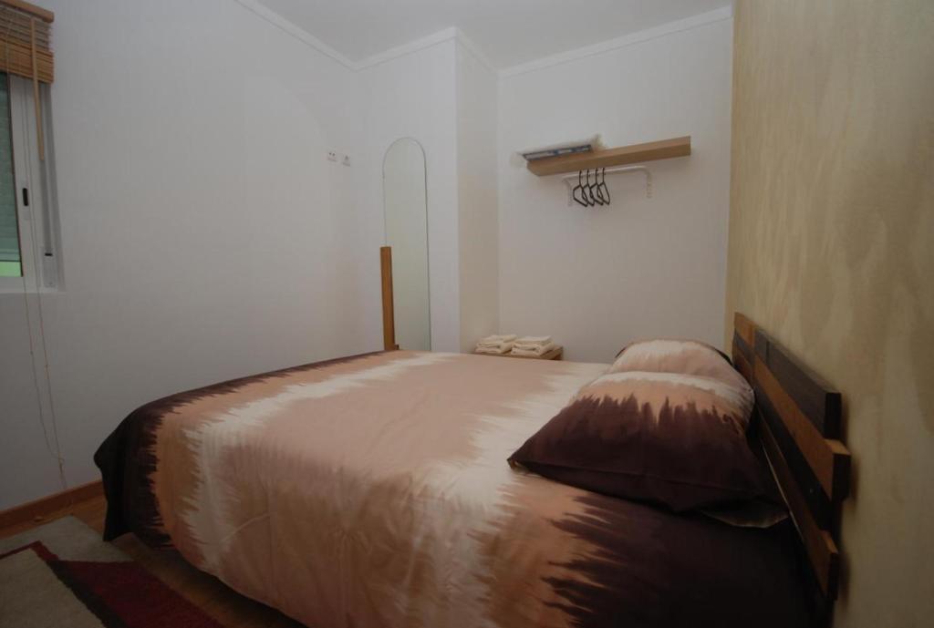 Postel nebo postele na pokoji v ubytování Green Wave Hostel
