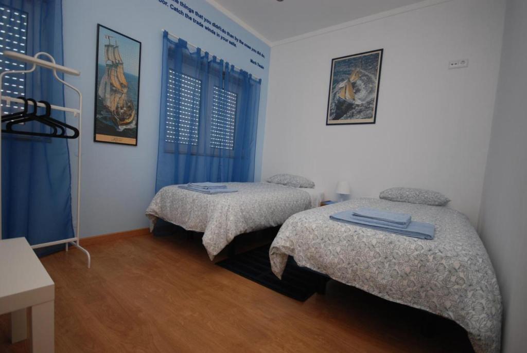 Postel nebo postele na pokoji v ubytování Green Wave Hostel