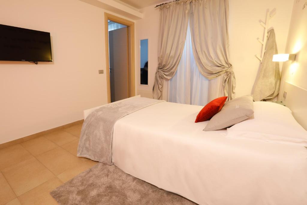 Postel nebo postele na pokoji v ubytování Le Onde Resort