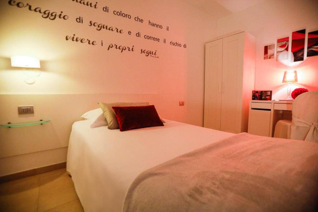 Postel nebo postele na pokoji v ubytování Le Onde Resort