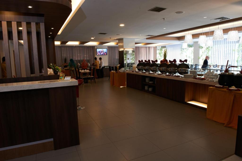 Lounge nebo bar v ubytování Winstar Hotel
