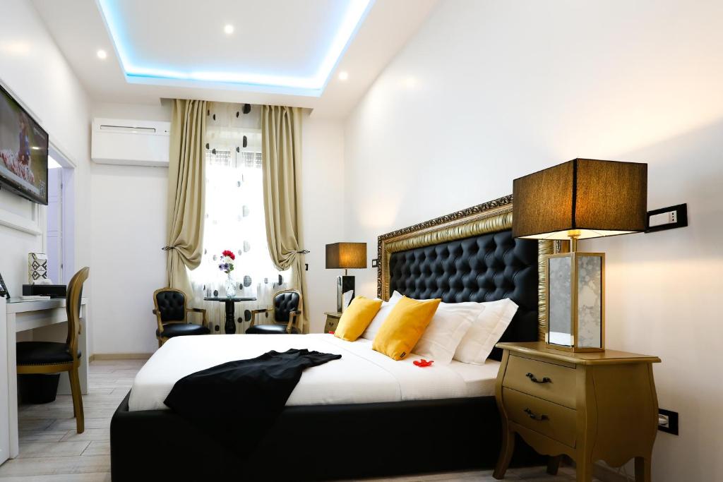 Postel nebo postele na pokoji v ubytování Escape Luxury Suite - CA Domus Collection