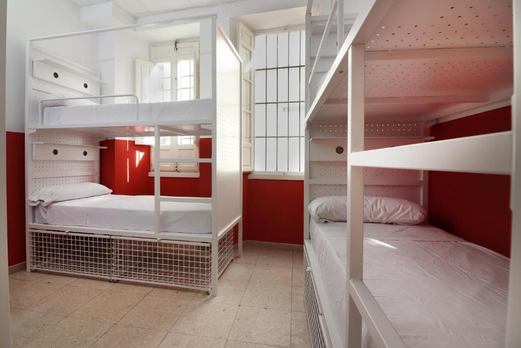 Postel nebo postele na pokoji v ubytování Feel Hostels City Center