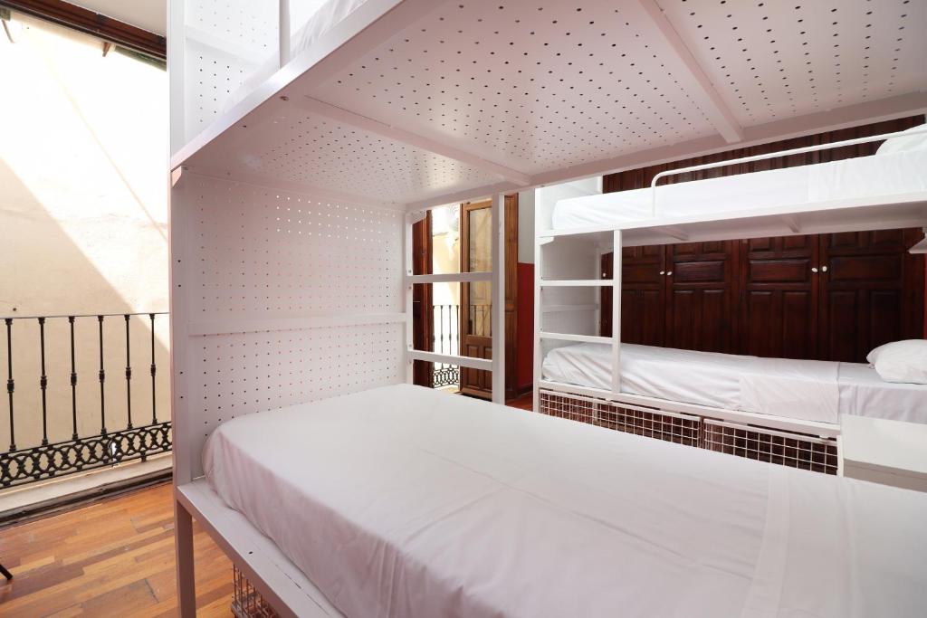 Postel nebo postele na pokoji v ubytování Feel Hostels City Center