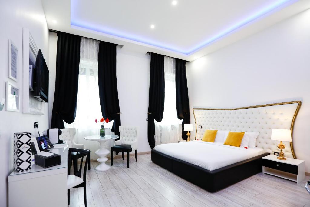 Postel nebo postele na pokoji v ubytování Escape Luxury Suite - CA Domus Collection