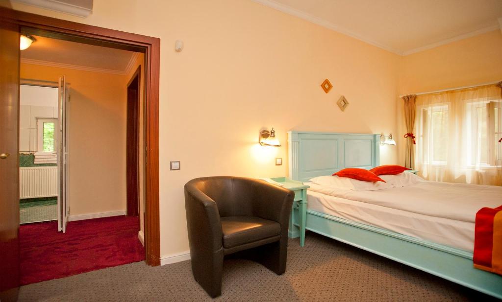 Postel nebo postele na pokoji v ubytování Hotel Bastion